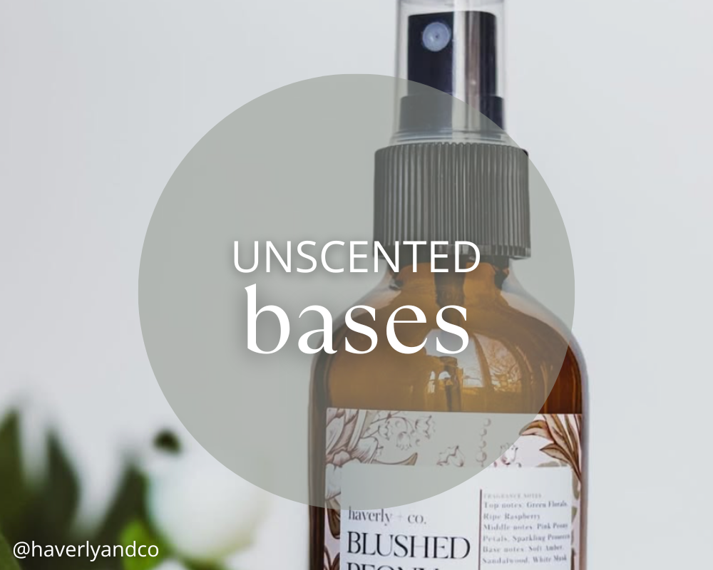 Room spray bottle with text showing unscented bases from midwestern fragrance company