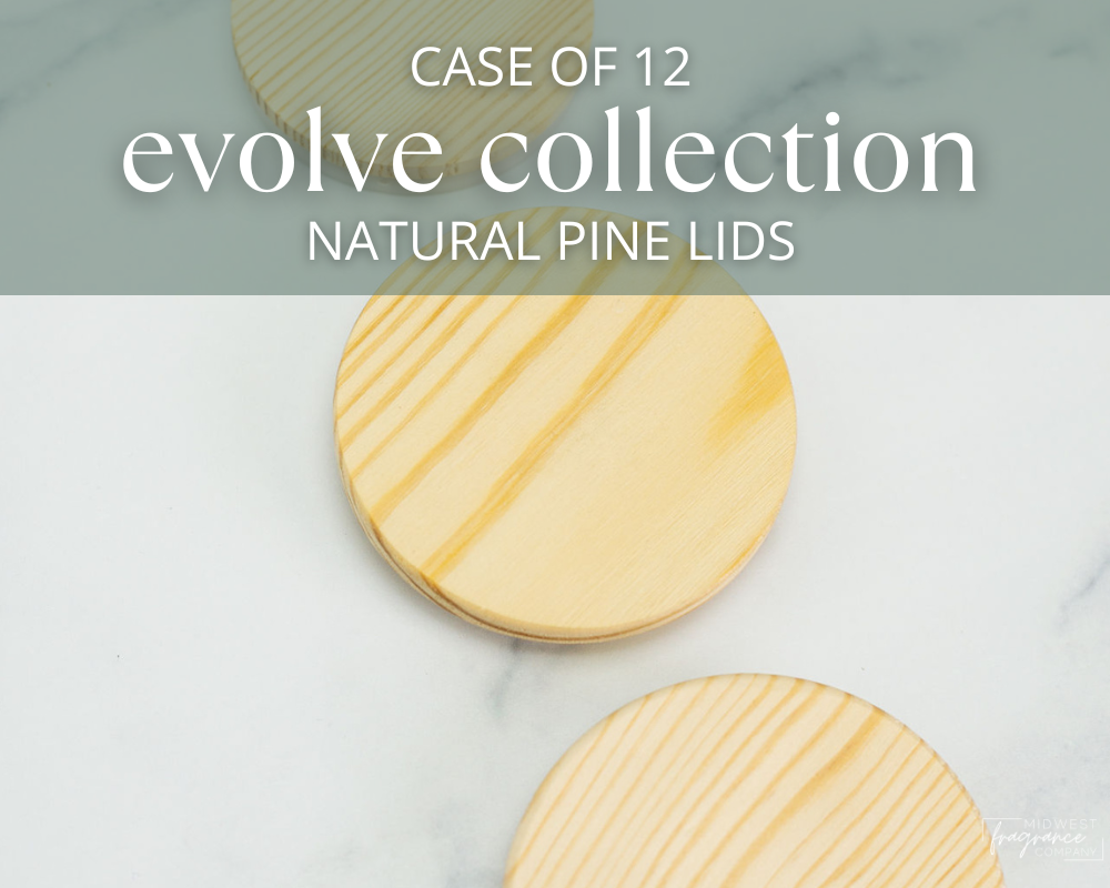 The top of three natural pine lids for the Evolve candle vessel on a white background.
