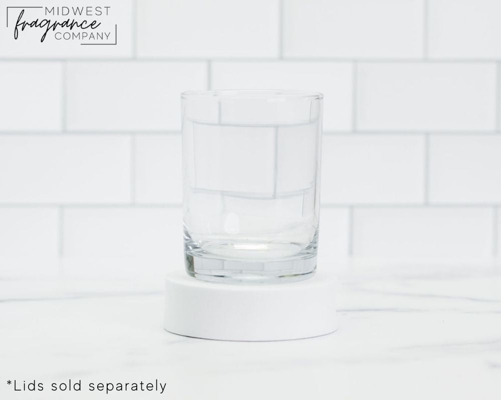 Straight sided, 11 oz. clear glass tumbler used as a vessel for candles