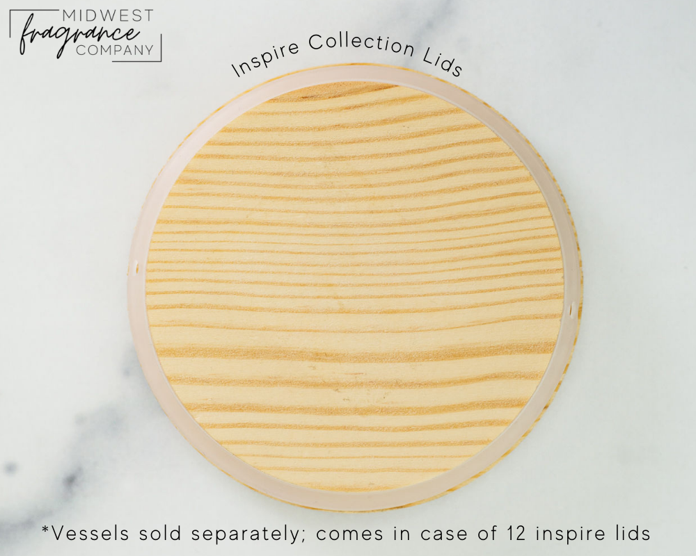 The bottom of a single pine lid for a candle vessel showing the natural wood variations and silicone ring that keeps the lid secure.