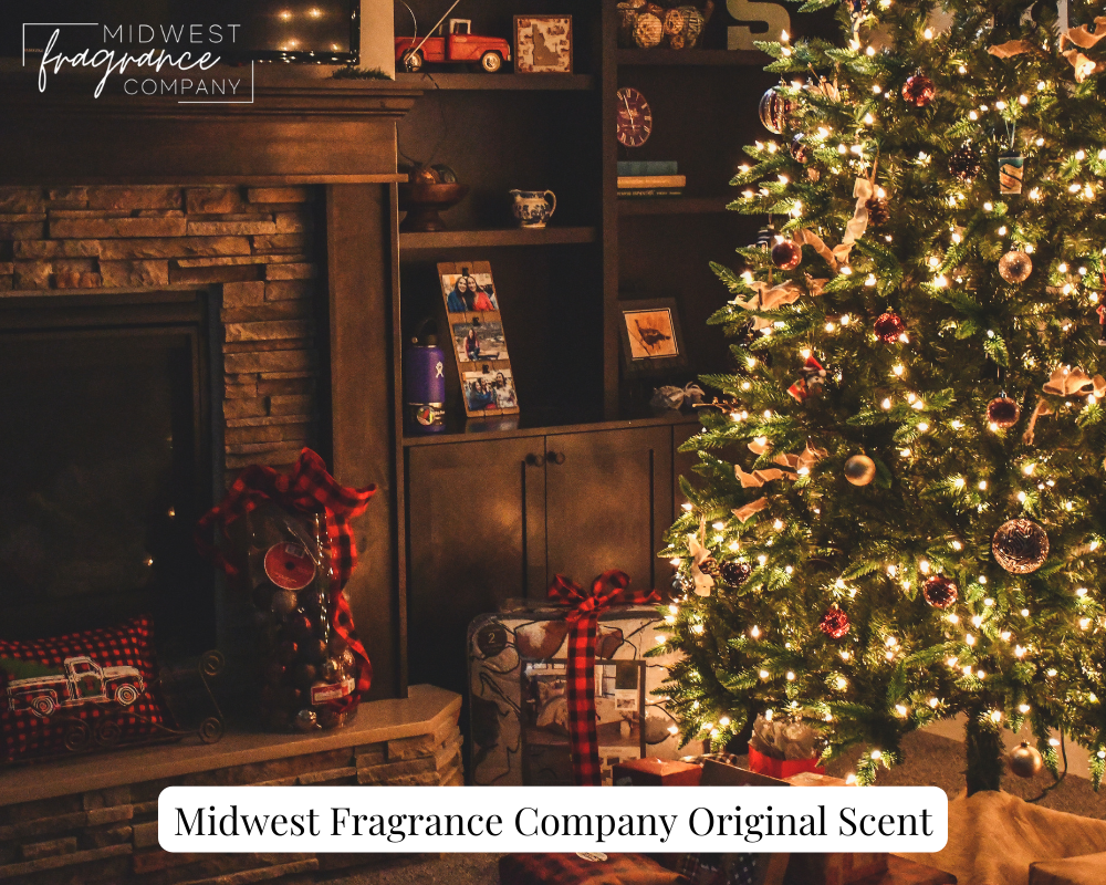 A lit Christmas tree in a cozy family room, with wrapped gifts and a fireplace adorned with framed photographs of merry memories.