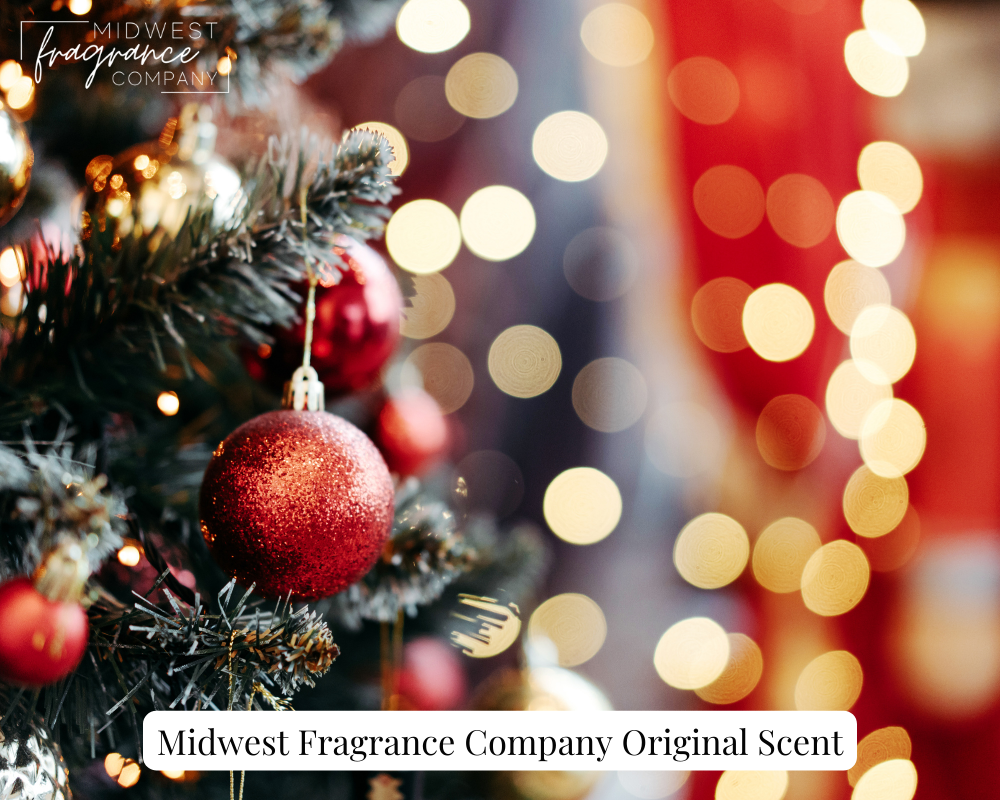 Old fashioned ornament on a tree with sparkling lights in a blurred background illustrating a fragrance called Vintage Christmas.