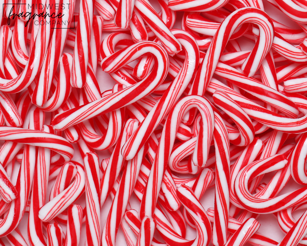 Close up overhead image of a large selection of red and white peppermint candy canes.