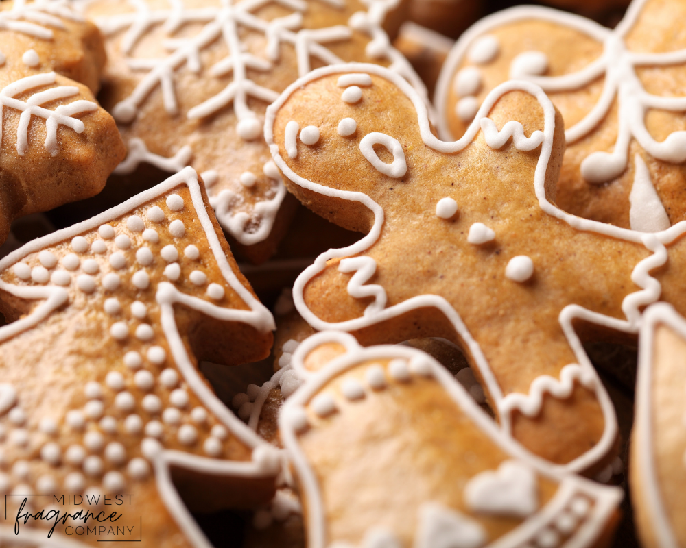 Closeup image of various shaped gingerbread cookies with white icing.