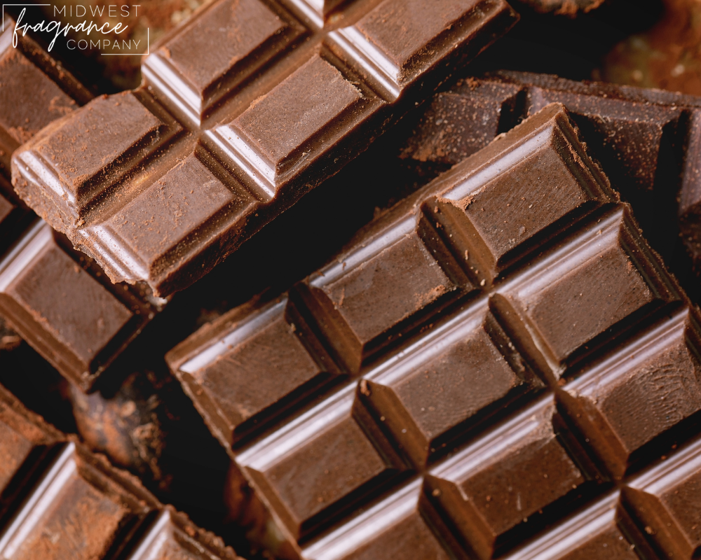 Close up image of squares of milk and dark chocolate.