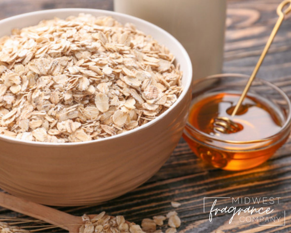A white ceramic bowl of warm honey, milk, and sweet honey and vanilla combine to create an comforting fragrance.  